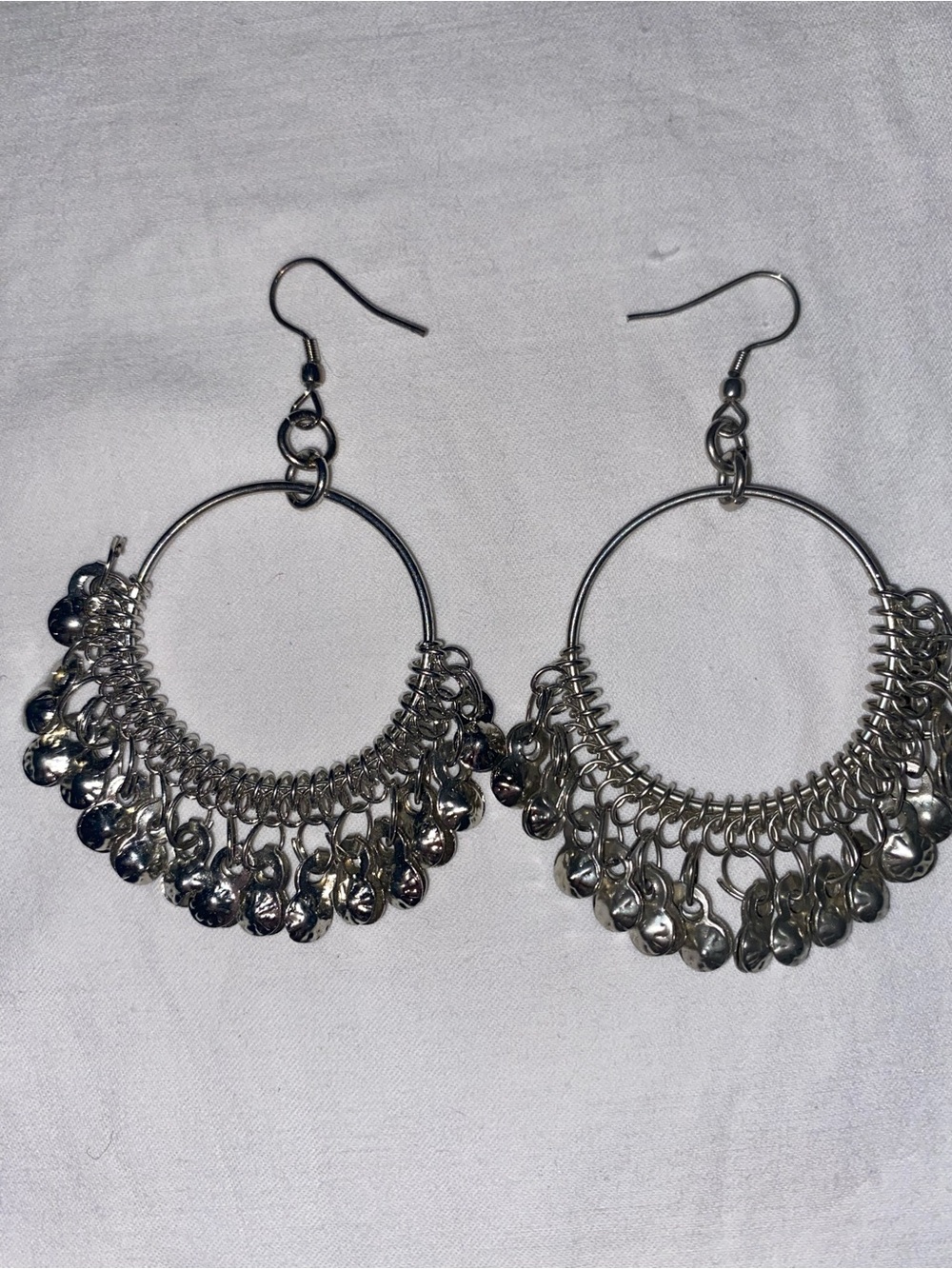 Silver Hoop Earrings with Dangling Disc Accents